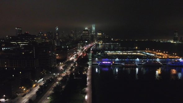 Aerial Drone Zoom Out Shot of West Side Highway at Night Royalty Free Stock Drone Video Footage