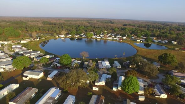 Mobile homes around a lake Royalty Free Stock Drone Video Footage