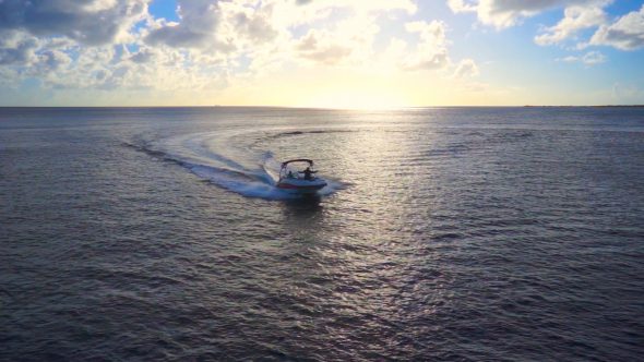 Boat In The Sunset Royalty Free Stock Drone Video Footage