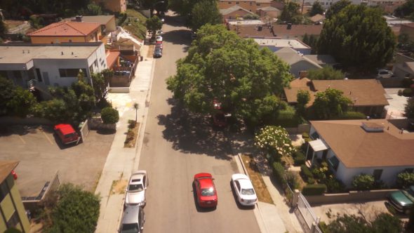 Residential Red Car Chase Royalty Free Stock Drone Video Footage