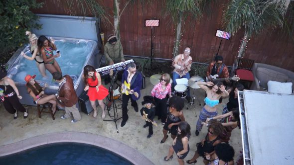 Poolside Band and Models Party 2 Royalty Free Stock Drone Video Footage