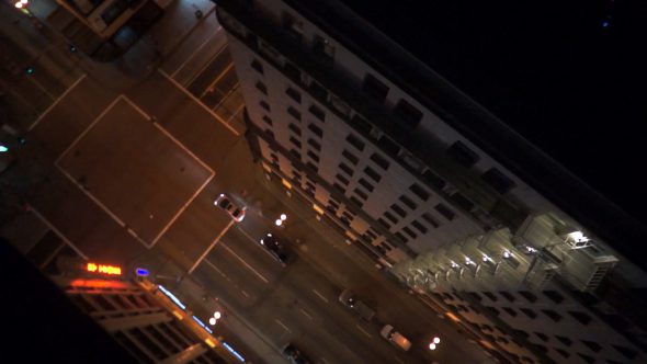City Intersection and Buildings at Night Royalty Free Stock Drone Video Footage
