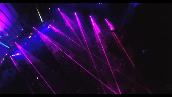 Aerial, purple lights over people at Cinespia Royalty Free Stock Drone Video Footage